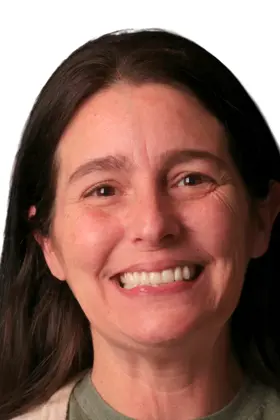 Patient enjoying a stunning new smile after All-on-X dental implants treatment.